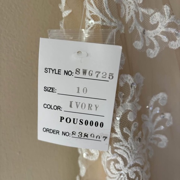 Elegant White Wedding Dress with Sheer Back - Picture 4 of 5